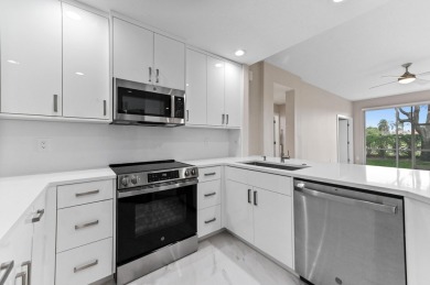 Introducing a sophisticatedly updated residence at 12454 Crystal on Westchester Golf and Country Club in Florida - for sale on GolfHomes.com, golf home, golf lot