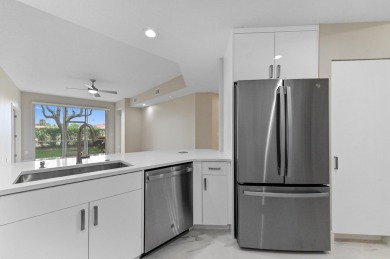 Introducing a sophisticatedly updated residence at 12454 Crystal on Westchester Golf and Country Club in Florida - for sale on GolfHomes.com, golf home, golf lot