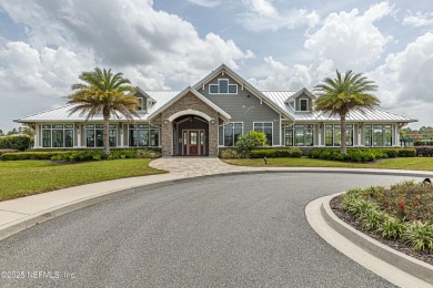 Discover modern sophistication in this popular Tivoli model on Eagle Landing Golf Club in Florida - for sale on GolfHomes.com, golf home, golf lot