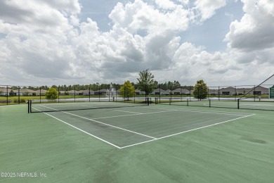Discover modern sophistication in this popular Tivoli model on Eagle Landing Golf Club in Florida - for sale on GolfHomes.com, golf home, golf lot