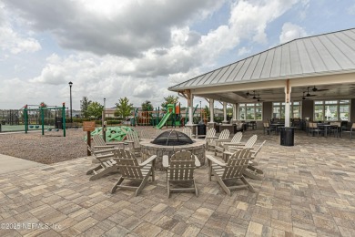 Discover modern sophistication in this popular Tivoli model on Eagle Landing Golf Club in Florida - for sale on GolfHomes.com, golf home, golf lot