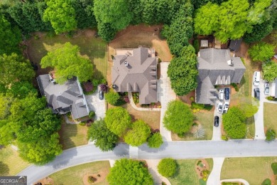 Welcome to Mirror Lake, where this stunning 4-sided brick house on Mirror Lake Golf Club in Georgia - for sale on GolfHomes.com, golf home, golf lot