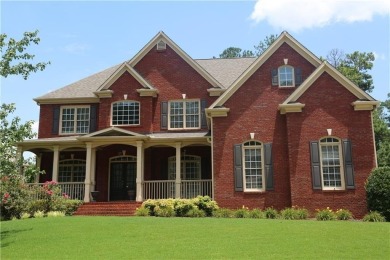 Discover the epitome of luxury living in this elegant on Brookstone Golf and Country Club in Georgia - for sale on GolfHomes.com, golf home, golf lot