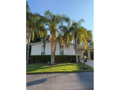 Big and Beautiful updated home on the 10th fairway of The on Hamptons Golf Club in Florida - for sale on GolfHomes.com, golf home, golf lot