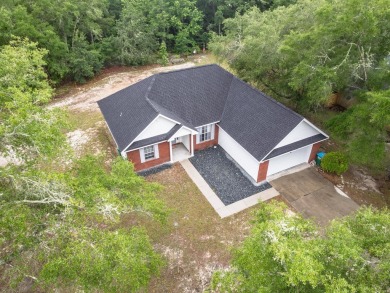 Welcome to this beautifully maintained 3-bedroom, 2-bathroom on Wildwood Country Club in Florida - for sale on GolfHomes.com, golf home, golf lot