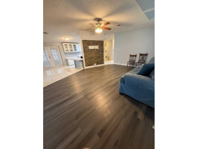 Big and Beautiful updated home on the 10th fairway of The on Hamptons Golf Club in Florida - for sale on GolfHomes.com, golf home, golf lot