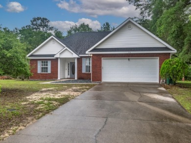 Welcome to this beautifully maintained 3-bedroom, 2-bathroom on Wildwood Country Club in Florida - for sale on GolfHomes.com, golf home, golf lot