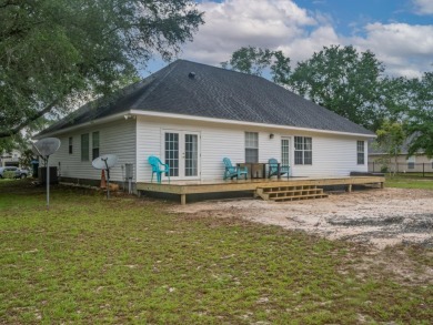 Welcome to this beautifully maintained 3-bedroom, 2-bathroom on Wildwood Country Club in Florida - for sale on GolfHomes.com, golf home, golf lot
