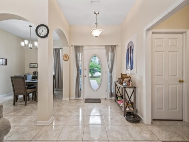 Welcome to this beautifully maintained 3-bedroom, 2-bathroom on Wildwood Country Club in Florida - for sale on GolfHomes.com, golf home, golf lot