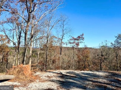 Beautiful view of mountains and water from this unrestricted lot on Currahee Golf Club in Georgia - for sale on GolfHomes.com, golf home, golf lot