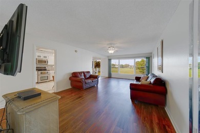 Welcome to this spacious 2-bedroom, 2-bathroom condo offering 1 on East Bay Golf Club in Florida - for sale on GolfHomes.com, golf home, golf lot