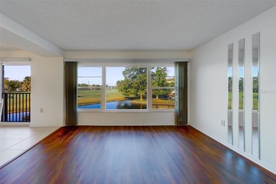 Welcome to this spacious 2-bedroom, 2-bathroom condo offering 1 on East Bay Golf Club in Florida - for sale on GolfHomes.com, golf home, golf lot