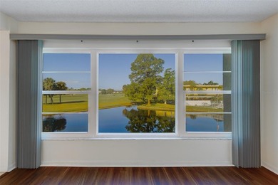 Welcome to this spacious 2-bedroom, 2-bathroom condo offering 1 on East Bay Golf Club in Florida - for sale on GolfHomes.com, golf home, golf lot