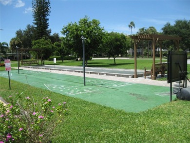 IRONWOOD CONDOS. 55+ (I BLDG.). First floor End unit allows for on Pinebrook/Ironwood Golf Course in Florida - for sale on GolfHomes.com, golf home, golf lot