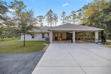 Nestled on a sprawling acre-plus corner lot, this newer charming on Juliette Falls Golf and Spa Club in Florida - for sale on GolfHomes.com, golf home, golf lot