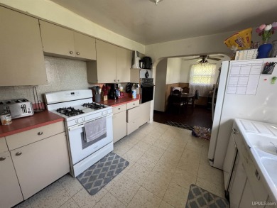 Welcome to this affordable 4-bedroom, 1-bath home situated on a on Crystal View Municipal Golf Course in Michigan - for sale on GolfHomes.com, golf home, golf lot