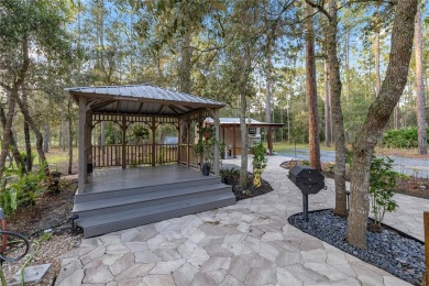 Nestled on a sprawling acre-plus corner lot, this newer charming on Juliette Falls Golf and Spa Club in Florida - for sale on GolfHomes.com, golf home, golf lot