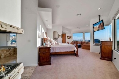 The Belgard pavers of the circular driveway lead up to this on Troon North Golf Club  in Arizona - for sale on GolfHomes.com, golf home, golf lot