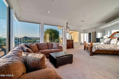 The Belgard pavers of the circular driveway lead up to this on Troon North Golf Club  in Arizona - for sale on GolfHomes.com, golf home, golf lot