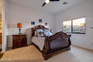 The Belgard pavers of the circular driveway lead up to this on Troon North Golf Club  in Arizona - for sale on GolfHomes.com, golf home, golf lot