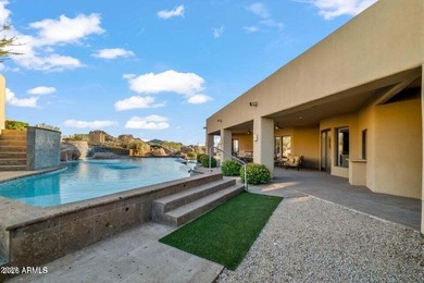 The Belgard pavers of the circular driveway lead up to this on Troon North Golf Club  in Arizona - for sale on GolfHomes.com, golf home, golf lot
