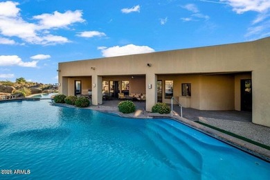 The Belgard pavers of the circular driveway lead up to this on Troon North Golf Club  in Arizona - for sale on GolfHomes.com, golf home, golf lot