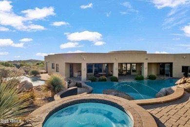 The Belgard pavers of the circular driveway lead up to this on Troon North Golf Club  in Arizona - for sale on GolfHomes.com, golf home, golf lot