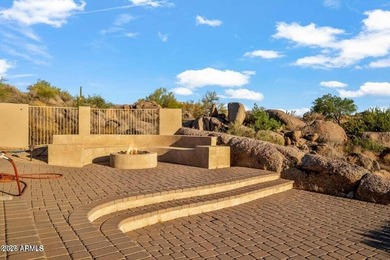 The Belgard pavers of the circular driveway lead up to this on Troon North Golf Club  in Arizona - for sale on GolfHomes.com, golf home, golf lot