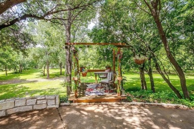 ENCHANTING 3-3-2 home nestled on a beautiful 1+ acre riverfront on Pecan Plantation Country Club in Texas - for sale on GolfHomes.com, golf home, golf lot