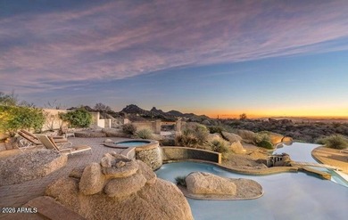 The Belgard pavers of the circular driveway lead up to this on Troon North Golf Club  in Arizona - for sale on GolfHomes.com, golf home, golf lot