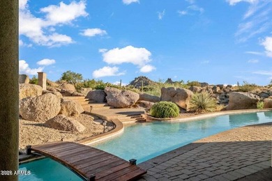 The Belgard pavers of the circular driveway lead up to this on Troon North Golf Club  in Arizona - for sale on GolfHomes.com, golf home, golf lot