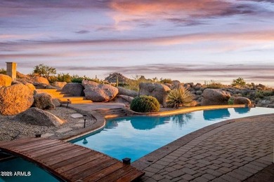The Belgard pavers of the circular driveway lead up to this on Troon North Golf Club  in Arizona - for sale on GolfHomes.com, golf home, golf lot