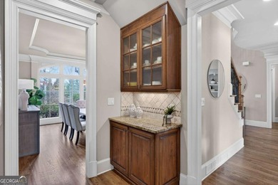 Experience the Pinnacle of Luxury Living at The Manor Golf and on Manor Golf and Country Club in Georgia - for sale on GolfHomes.com, golf home, golf lot