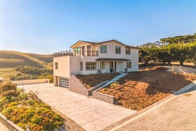 This is a beautiful, brand new home that has soaring views on Carmel Valley Ranch Golf Course in California - for sale on GolfHomes.com, golf home, golf lot