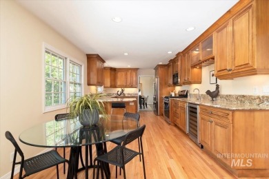 Discover luxury living in this stunning 6-bed, 4-bath home on Crane Creek Country Club in Idaho - for sale on GolfHomes.com, golf home, golf lot