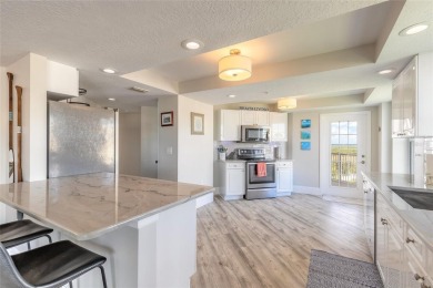 Resort Style Living Everyday in this immaculately remodeled on Harbour Village Golf and Yacht Club in Florida - for sale on GolfHomes.com, golf home, golf lot