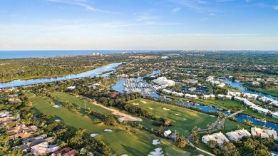 Experience the epitome of waterfront luxury in this first-floor on Jonathans Landing Golf Club in Florida - for sale on GolfHomes.com, golf home, golf lot