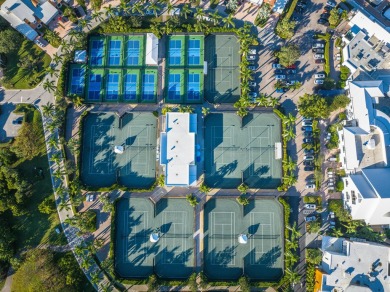 Experience the epitome of waterfront luxury in this first-floor on Jonathans Landing Golf Club in Florida - for sale on GolfHomes.com, golf home, golf lot