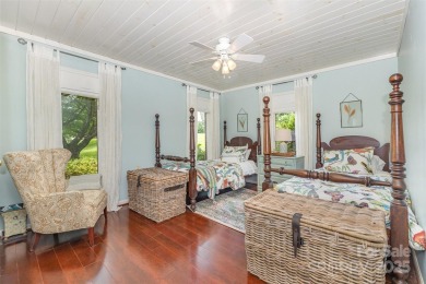 Endless possibilities! Make this waterfront retreat your primary on Woodbridge Golf Links in North Carolina - for sale on GolfHomes.com, golf home, golf lot