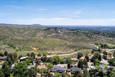 Discover luxury living in this stunning 6-bed, 4-bath home on Crane Creek Country Club in Idaho - for sale on GolfHomes.com, golf home, golf lot