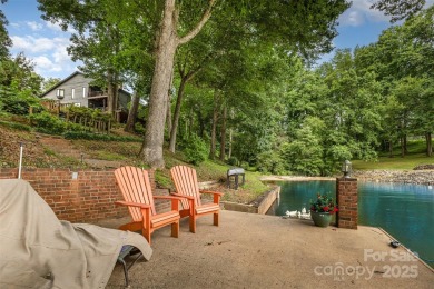 Endless possibilities! Make this waterfront retreat your primary on Woodbridge Golf Links in North Carolina - for sale on GolfHomes.com, golf home, golf lot