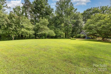 Endless possibilities! Make this waterfront retreat your primary on Woodbridge Golf Links in North Carolina - for sale on GolfHomes.com, golf home, golf lot