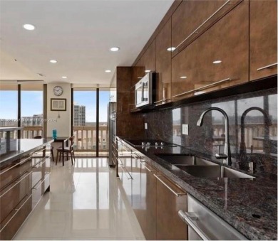 High-floor corner unit with panoramic ocean, Intracoastal & city on Turnberry Isle Resort and Club in Florida - for sale on GolfHomes.com, golf home, golf lot