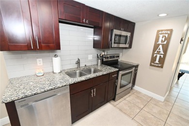 $7,000 PRICE REDUCTION. This stunning 4-bedroom, 3-bathroom home on Tuscawilla Country Club in Florida - for sale on GolfHomes.com, golf home, golf lot