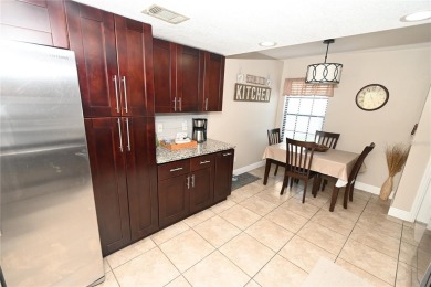 $7,000 PRICE REDUCTION. This stunning 4-bedroom, 3-bathroom home on Tuscawilla Country Club in Florida - for sale on GolfHomes.com, golf home, golf lot