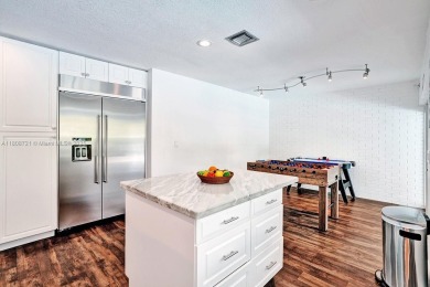 Step into this stunning 4-bedroom, 3-Bath home on a 9,500sqft on The Diplomat Golf Resort and Spa in Florida - for sale on GolfHomes.com, golf home, golf lot