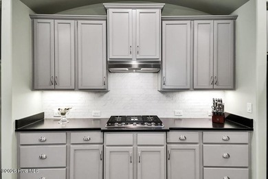 Live the Carolina dream in the Hammocks at Shelmore, nestled on Cape Fear National At Brunswick Forest in North Carolina - for sale on GolfHomes.com, golf home, golf lot