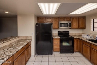 Beautifully located townhome/condo in one of Lake Havasu's most on London Bridge Golf Course in Arizona - for sale on GolfHomes.com, golf home, golf lot