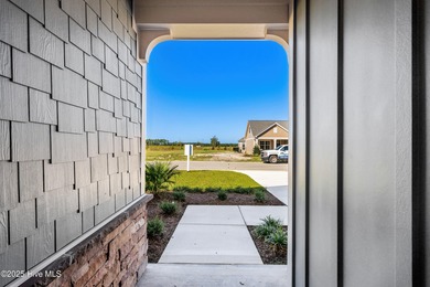 Welcome to The Courtyards by Carrell! This Capri Designer Luxury on Ocean Ridge Plantation in North Carolina - for sale on GolfHomes.com, golf home, golf lot