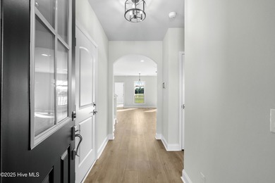 Welcome to The Courtyards by Carrell! This Capri Designer Luxury on Ocean Ridge Plantation in North Carolina - for sale on GolfHomes.com, golf home, golf lot